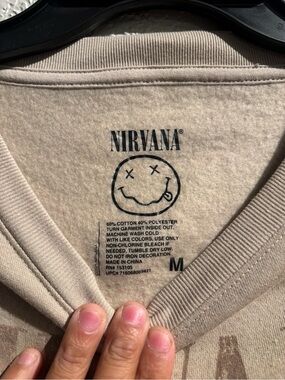 NIRVANA Beige V-Neck Sweater with Smiley Logo